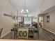 The dining area flows into the living room with a fireplace and balcony at 210 Westleton Dr. # 13-D, Myrtle Beach, SC 29572