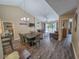 The dining area flows into the living room with a fireplace and balcony at 210 Westleton Dr. # 13-D, Myrtle Beach, SC 29572
