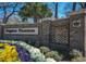 Entrance sign to Kingston Plantation lined with colorful flowering bushes at 210 Westleton Dr. # 13-D, Myrtle Beach, SC 29572