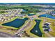 Aerial view of the community showcasing multiple ponds, lush greenery, and well-planned residential areas at 218 Calhoun Falls Dr., Myrtle Beach, SC 29579