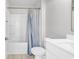 Neat bathroom showcasing a tub with shower, toilet, and white vanity at 218 Calhoun Falls Dr., Myrtle Beach, SC 29579