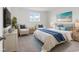 Bright bedroom with blue accents, wicker furniture, and a comfortable bed at 218 Calhoun Falls Dr., Myrtle Beach, SC 29579