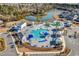 Aerial view of the community pool, offering various amenities like lounge chairs, cabanas, and wading areas at 218 Calhoun Falls Dr., Myrtle Beach, SC 29579