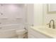 Bathroom featuring a tub, toilet, vanity, and bright light fixtures at 2191 Jasmine Rd., Loris, SC 29569