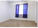 Carpeted bedroom showcasing natural light filtering through the window at 2191 Jasmine Rd., Loris, SC 29569