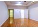 Bright bedroom featuring hardwood floors and neutral wall paint at 2191 Jasmine Rd., Loris, SC 29569