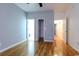 Bedroom featuring hardwood floors, three doors and neutral walls at 2191 Jasmine Rd., Loris, SC 29569
