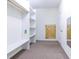 Walk-in closet with built-in shelves, hanging rods, and ample storage space at 2191 Jasmine Rd., Loris, SC 29569