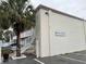 Exterior view of Heather Inn Villas condo building with palm tree at 2204 South Perrin Dr. # 29, North Myrtle Beach, SC 29582