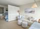 Inviting living space with a comfortable chaise lounge, coastal accents, and a stylish room divider at 2204 South Perrin Dr. # 29, North Myrtle Beach, SC 29582