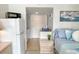 Cozy living space featuring a kitchenette, daybed, and beachy decor for a relaxing coastal vibe at 2204 South Perrin Dr. # 29, North Myrtle Beach, SC 29582