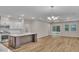 Open-concept living area with recessed lighting and an adjacent kitchen and dining space at 2220 Flatleaf Ct, Longs, SC 29568