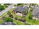 Aerial view of a red brick house with an expansive backyard and mature landscaping at 2384 Covington Dr., Myrtle Beach, SC 29579
