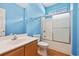 Bright bathroom featuring a single vanity, shower, and tile flooring at 2384 Covington Dr., Myrtle Beach, SC 29579