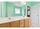 This bathroom features a double vanity, tile floors, and an attached shower at 2384 Covington Dr., Myrtle Beach, SC 29579