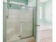 Shower and Tub combo with a glass enclosure and chrome fixtures at 2384 Covington Dr., Myrtle Beach, SC 29579