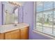 Bathroom with single vanity and a window for natural light at 2384 Covington Dr., Myrtle Beach, SC 29579