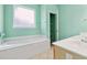 This bathroom features a combination shower and tub, as well as tiled flooring at 2384 Covington Dr., Myrtle Beach, SC 29579