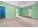 This bedroom boasts a neutral carpet, closet, and easy access to the ensuite bathroom at 2384 Covington Dr., Myrtle Beach, SC 29579