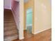 Carpeted staircase in a bright home, leading to the upper level at 2384 Covington Dr., Myrtle Beach, SC 29579