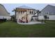 Backyard features a patio with lounge chairs and an outdoor grill, perfect for gatherings at 277 Splendor Circle, Murrells Inlet, SC 29576