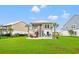Home with a large backyard, a patio featuring grilling and lounge space, perfect for entertaining at 277 Splendor Circle, Murrells Inlet, SC 29576