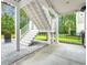 Covered backyard patio provides a relaxing space to enjoy the outdoors at 277 Splendor Circle, Murrells Inlet, SC 29576
