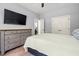 This bedroom features a ceiling fan, a tv, and ample storage space at 277 Splendor Circle, Murrells Inlet, SC 29576