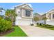 Attractive home showcasing a well-manicured lawn and two-car garage at 277 Splendor Circle, Murrells Inlet, SC 29576