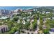 Birds-eye view of a home’s location among lush trees with a pin locator and city and ocean views beyond at 315 73Rd Ave. N # 2, Myrtle Beach, SC 29572