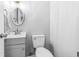 This bathroom features a decorative mirror and gray vanity at 315 73Rd Ave. N # 2, Myrtle Beach, SC 29572