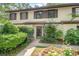 Charming front entrance with lush landscaping and inviting walkway at 315 73Rd Ave. N # 2, Myrtle Beach, SC 29572