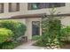 Charming front entrance with lush landscaping and inviting walkway to front door at 315 73Rd Ave. N # 2, Myrtle Beach, SC 29572