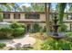 Charming townhome featuring a lush landscaped front yard with a beautiful fountain at 315 73Rd Ave. N # 2, Myrtle Beach, SC 29572