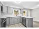 Beautiful kitchen with gray cabinets, white countertops, and stainless steel appliances at 315 73Rd Ave. N # 2, Myrtle Beach, SC 29572