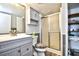 Bathroom featuring a shower and gray vanity for a modern and clean aesthetic at 3308 S Ocean Blvd. # 2_B, North Myrtle Beach, SC 29582