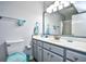 Clean, well-lit bathroom with vanity, toilet, and shower at 3308 S Ocean Blvd. # 2_B, North Myrtle Beach, SC 29582