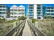 Wooden walkway leading to beachfront condos and beautiful beach views at 3308 S Ocean Blvd. # 2_B, North Myrtle Beach, SC 29582