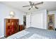 Bedroom featuring a bed, dresser, closet, and natural light from the window at 3308 S Ocean Blvd. # 2_B, North Myrtle Beach, SC 29582