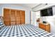 Bedroom featuring a TV, dresser, and closet for ample storage at 3308 S Ocean Blvd. # 2_B, North Myrtle Beach, SC 29582
