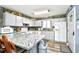 Bright kitchen boasts ample cabinet space, modern appliances, and a breakfast bar at 3308 S Ocean Blvd. # 2_B, North Myrtle Beach, SC 29582
