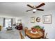 Open-concept living room and dining area with plenty of natural light and a comfortable sofa at 3308 S Ocean Blvd. # 2_B, North Myrtle Beach, SC 29582