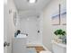 Bathroom featuring a modern shower, vanity, decorative mirror, and ocean-themed decor at 3519 Cates Bay Hwy., Conway, SC 29527