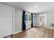 A view of the open-concept living area featuring hardwood floors and a window at 3519 Cates Bay Hwy., Conway, SC 29527
