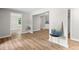 A view of the open-concept living area with modern decor and hardwood flooring at 3519 Cates Bay Hwy., Conway, SC 29527