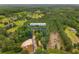 Aerial view of the property showing the approximate lot lines and surrounding wooded area at 3519 Cates Bay Hwy., Conway, SC 29527