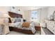 Well-lit main bedroom featuring neutral tones, framed art, and comfortable furnishings at 3562 Ashridge Way, Conway, SC 29526