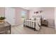 Cozy bedroom with neutral carpeting and a metal framed bed at 3579 Ashridge Way, Conway, SC 29526