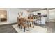 Dining area with rustic wood table and chairs, open to kitchen at 3579 Ashridge Way, Conway, SC 29526