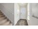 Inviting foyer with staircase, light gray walls, hardwood floor, and a front door with decorative window at 3579 Ashridge Way, Conway, SC 29526
